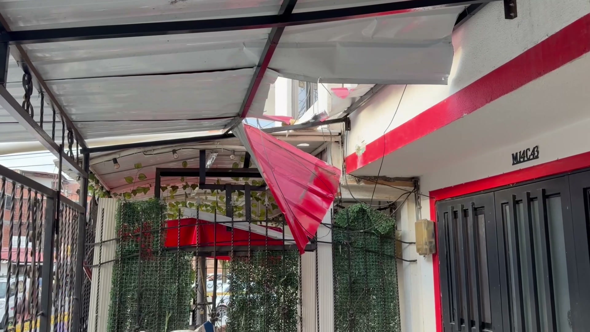 Damage to the outside of Edwin and Valentina's home