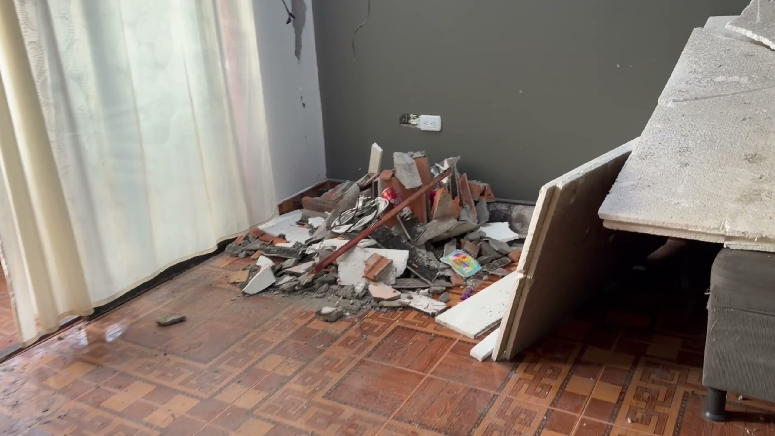 Rubble inside Edwin and Valentina's home